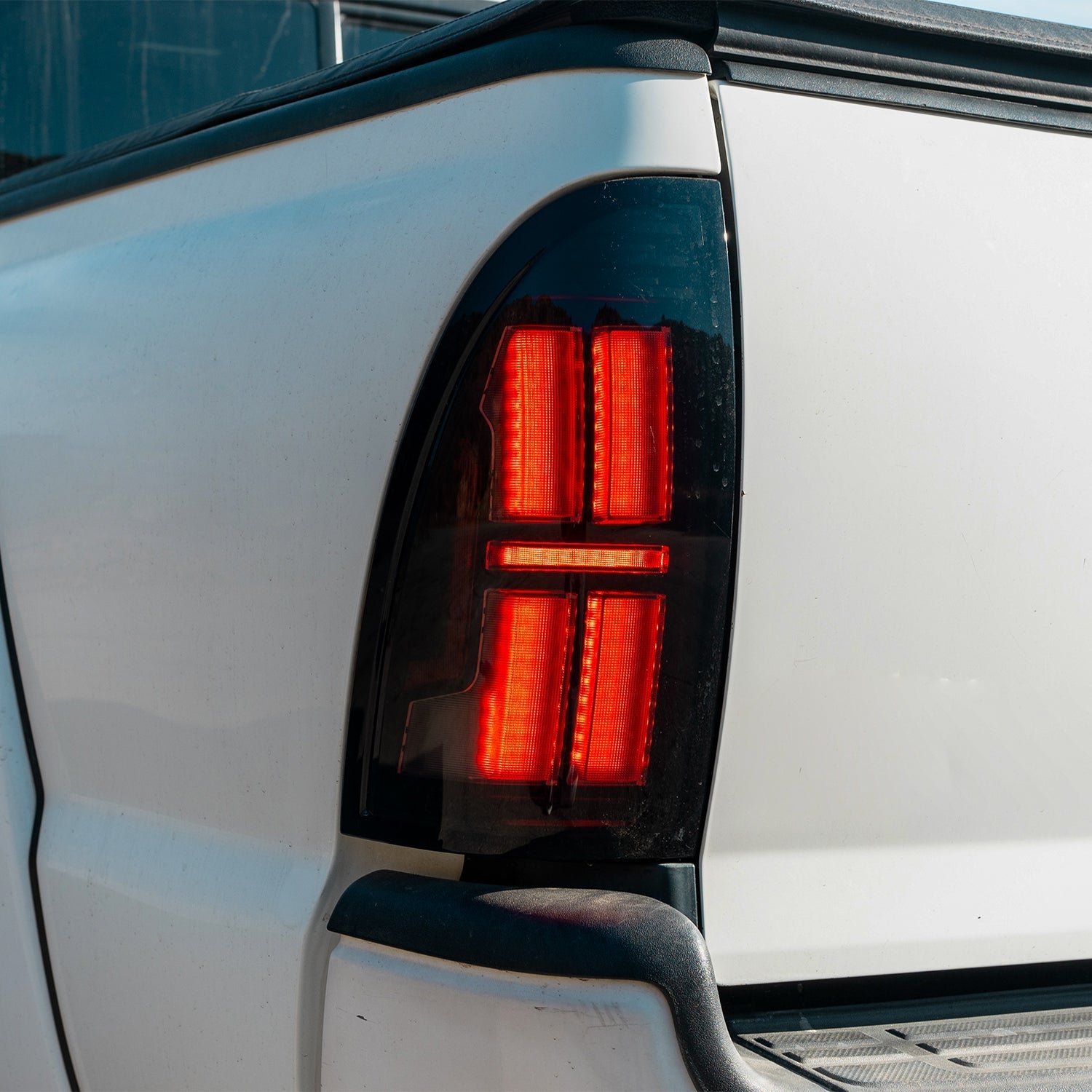 05-15 Toyota Tacoma NOVA-Series Prismatic LED Tail Lights Alpha-Black | AlphaRex