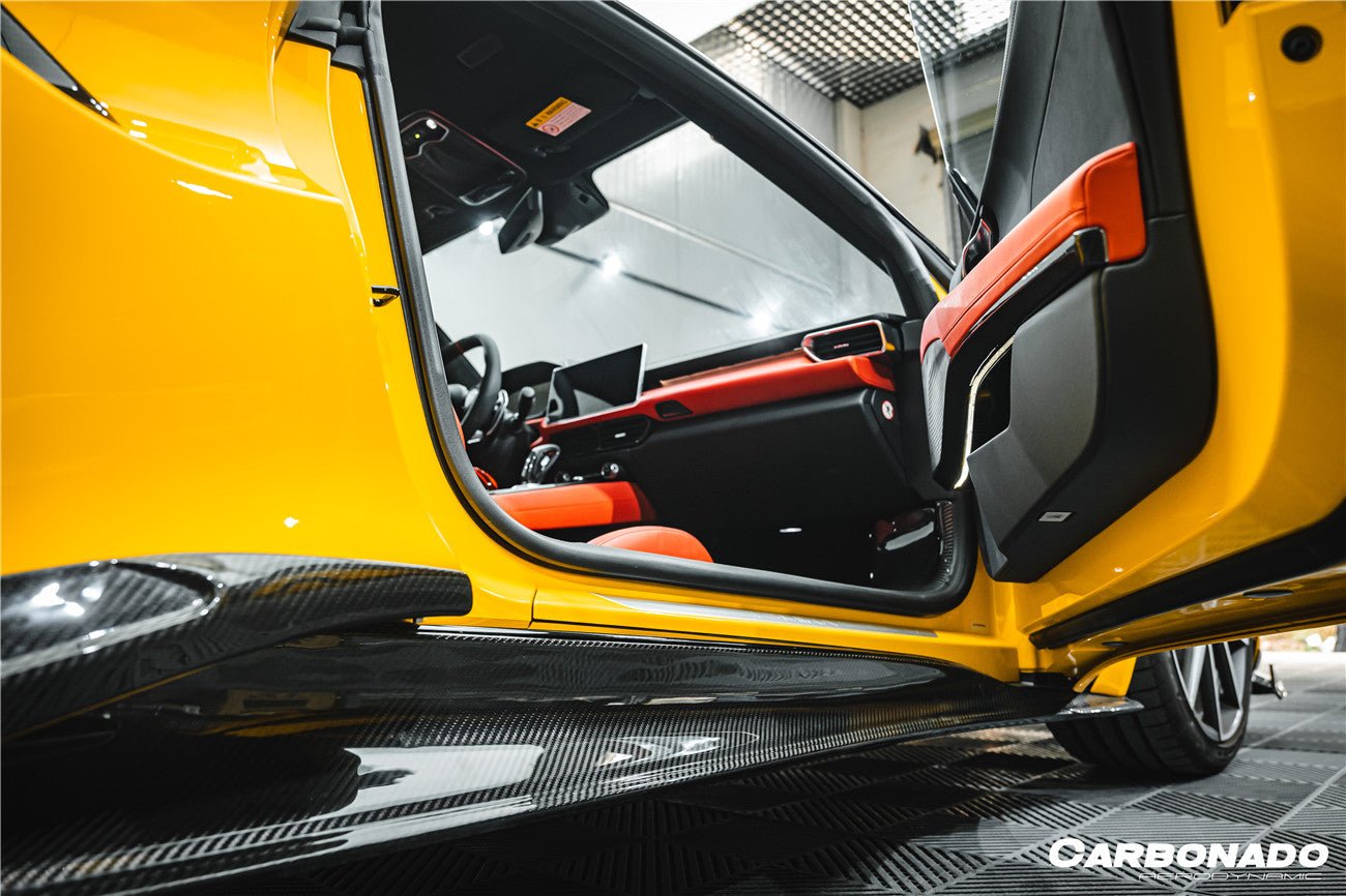 2021-2024 Lotus Emira NYO MNK Style Dry Carbon Fiber Door Sills - Carbonado