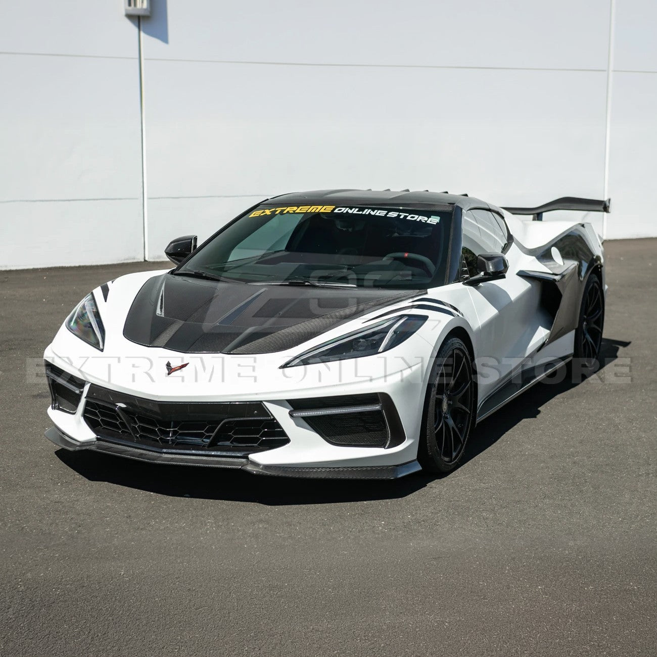 Close-up image of the Corvette C8 EOS Performance Track Style Double-Sided Dry Carbon Fiber Front Hood showing the premium dry carbon weave, lightweight construction, and aggressive aerodynamic design that enhances both performance and style.