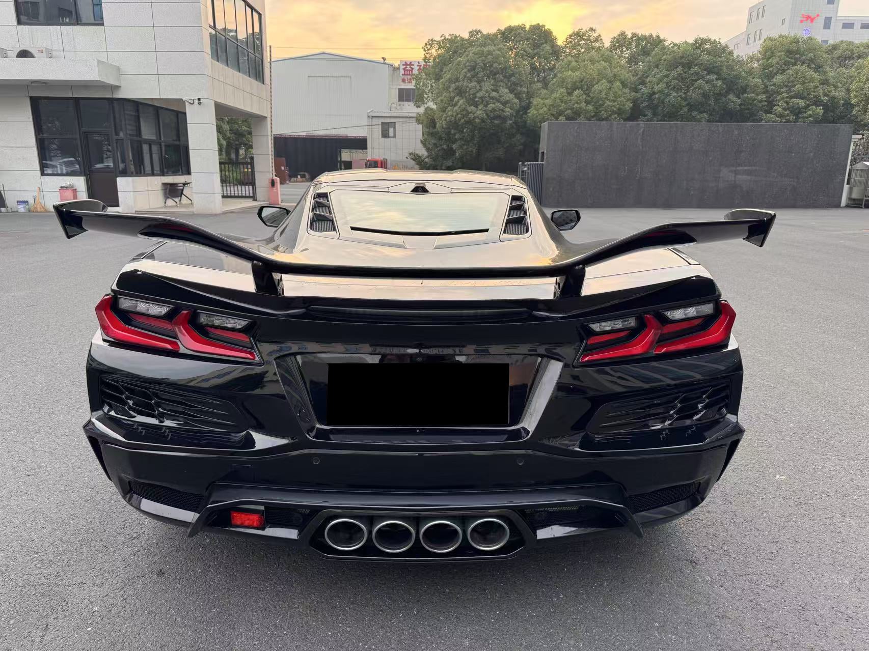 2020-2025 Corvette C8 Stingray Z06 Style Rear Bumper with Exhaust System - Carbonado